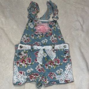 Blue floral overalls size 5.
